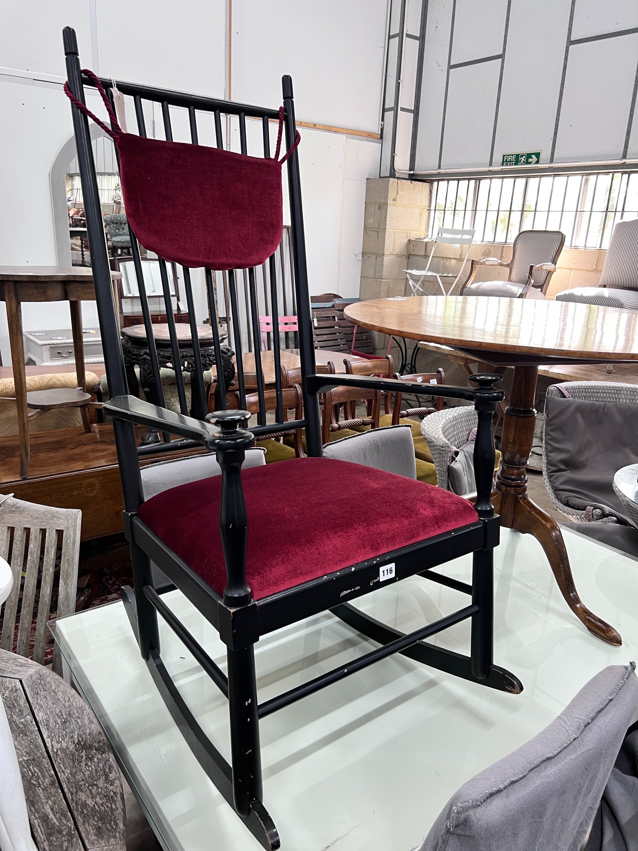 Karl Axel Adolfsson for Gemele - An Isabella ebonised rocking chair, width 56cm, depth 48cm, height 115cm *Please note the sale commences at 9am.